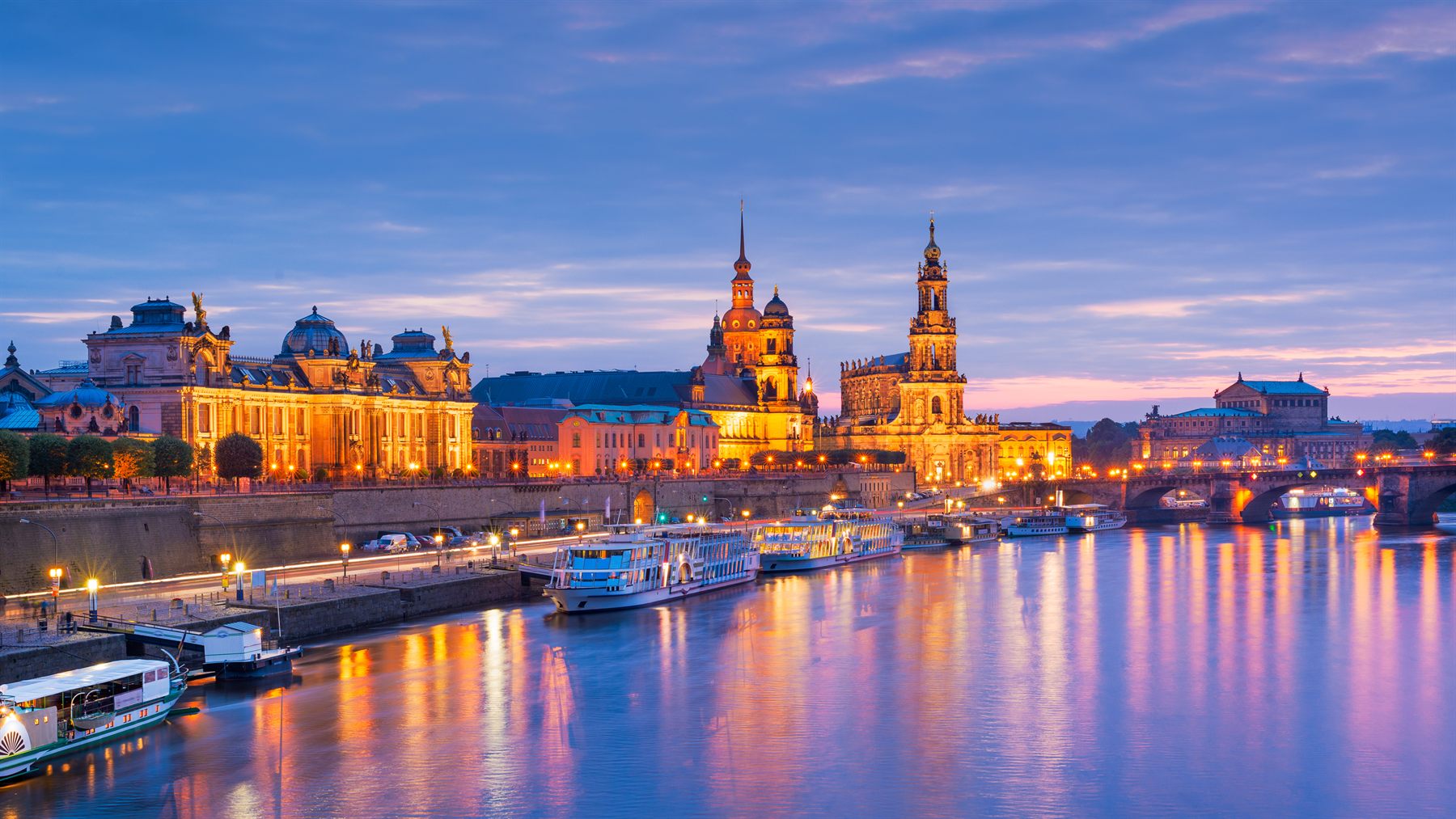 Dresden’s illuminated riverfront on the Elbe at dusk